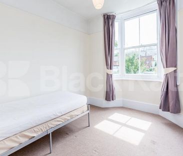 large two bedroom split level property situated in Muswell Hill - Photo 6