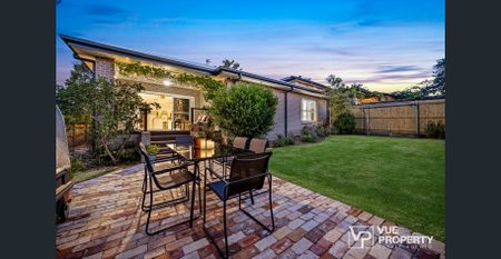 Where modern design meets peaceful living in a single-level family home - Photo 2