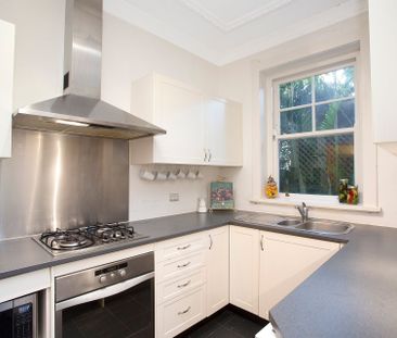 Elegant Garden Apartment - Unmatched Convenience & No Common Walls - Photo 1