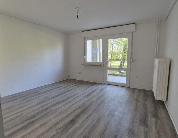 Green happiness on the ground floor: cozy single apartment with balcony - Photo 1