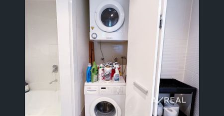 Elegant Furnished Apartment with Secure Parking & Premium Amenities - Photo 5