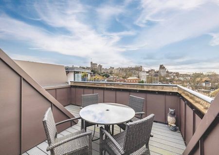 Elevate your lifestyle in this unique residence where modern sophistication meets historic charm. - Photo 5