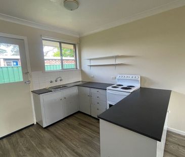 Brick 2-Bedroom Unit in Convenient Location - Photo 5