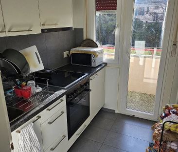 Appartement de 2.5 pièces au rez-de-chaussée - Photo 3