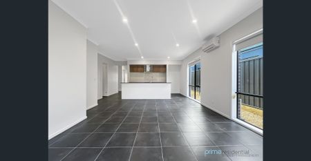 4-Bedroom Family Home with Two Living Areas! - Photo 3