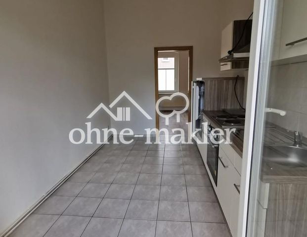 Gemütliche 1-Raumwohnung mit Balkon und Einbauküche - Foto 1