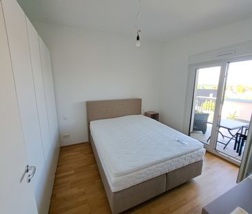 Moderne DG-Wohnung mit Dachterrasse, Balkon, TG-Platz & Weitblick i... - Foto 5