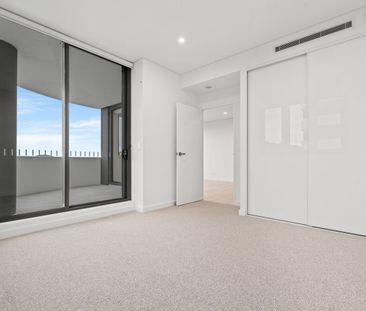 Luxury Living at the Archibald – Stunning Water & District Views - Photo 3