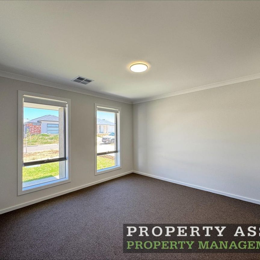 Beautiful Brand-New Family Home with Solar & Second Living Area - Photo 1