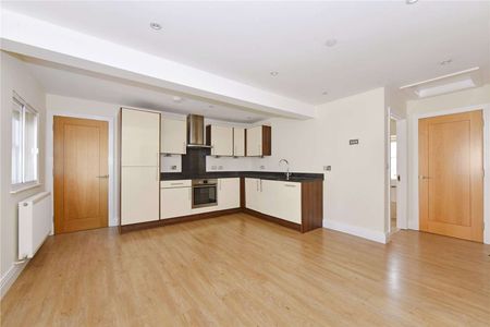 Centrally located one bedroom top floor apartment. One allocated parking space included. - Photo 2