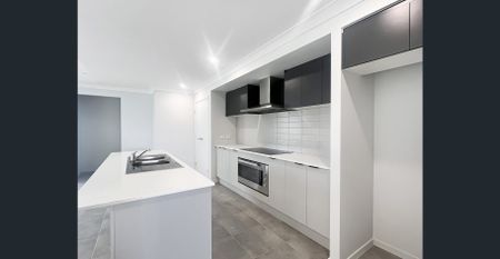 Modern Coastal Living in Beautiful Bushland Beach - Photo 5