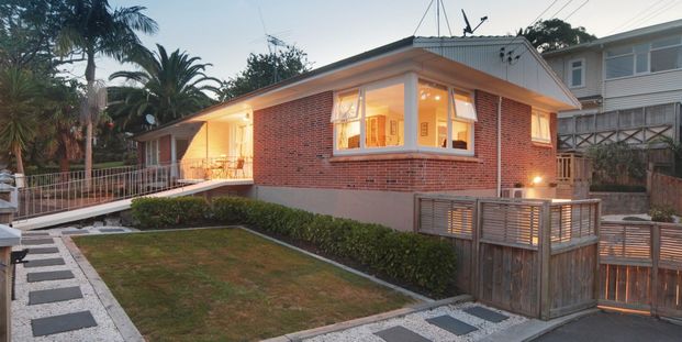 brick and tile duplex home in a prime location - Photo 1