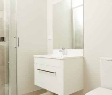 Modern Two-Bedroom Townhouse in Prime Location - Photo 3