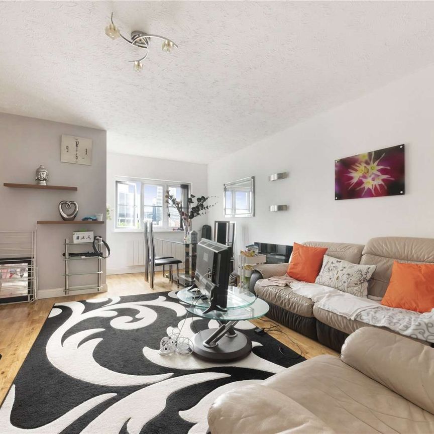 The property is located on the dockside with direct views of the dock. There is a large lounge with wooden floors and a separate kitchen which is all in good condition. - Photo 1