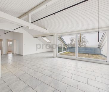 Stylish 4.5-room attic apartment with far view - Photo 1