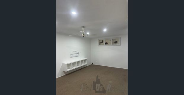 Low-Maintenance Family Home with Spacious Yard & Solar Power - Photo 1