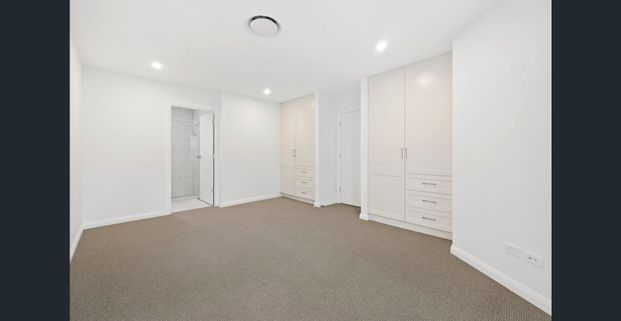 Stunning Brand New 4-Bedroom Townhouse - Photo 1