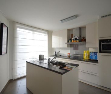 Knap appartement met twee slaapkamers, twee terrassen en standplaats in Hoeselt centrum - Photo 5