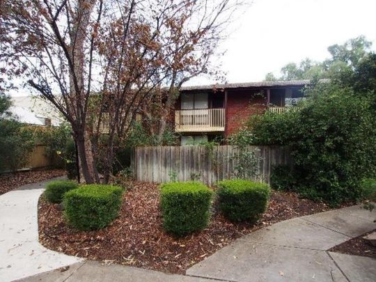 Spacious 2 bedroom townhouse in private garden setting - Photo 1