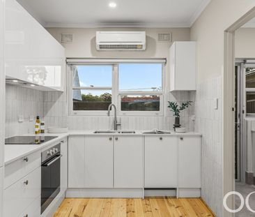 Open the Door to Freshly Renovated, Low-Maintenance Living in Leafy... - Photo 2