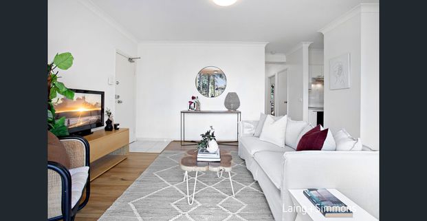 Exquisite Northeast-Facing Balcony with a Serene and Private Leafy View! - Photo 1