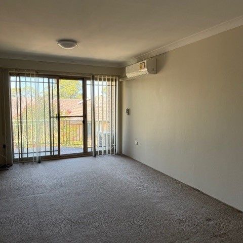 Freshly Painted, New Kitchen Two Bedroom Top Floor Unit - Photo 1