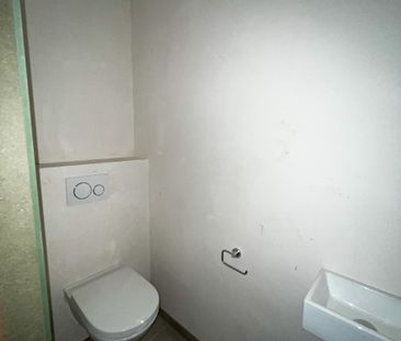 Ruim nieuwbouwappartement met twee slpk. in Beveren-Leie - Photo 2