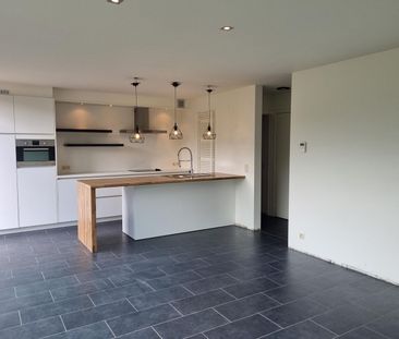Knap gelijkvloers éénslaapkamerappartement met tuin en garagebox. - Photo 4