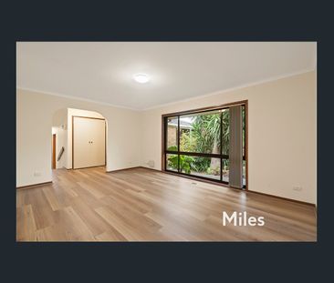 FRESHLY UPDATED THREE BEDROOM UNIT - Photo 1