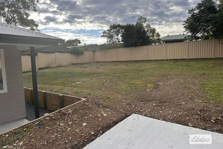BRAND NEW PRIVATE GRANNY FLAT with yard maintenance and water included! - Photo 5