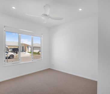 Modern Palmview Living with Media Room & Study Nook - Photo 3