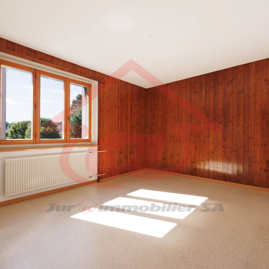 Appartement de 4 pièces au rez-de-chaussée à Delémont - Photo 1