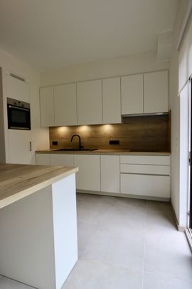 Gerenoveerde rijwoning met 2 slaapkamers en stadskoer. - Foto 1