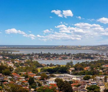 Near New 1 bedroom apartment plus sunny room with stunning views, in the heart of Hurstville for lease - Photo 2