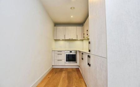 To Let – a one-bedroom flat in the sought after Factory No.1 development, well placed for both local amenities and city links. This immaculate property offers an open-plan reception room with direct access to a balcony, creating a practical space for everyday living and relaxing. The open-plan kitchen is fitted with Smeg appliances, providing a well-equipped setting for cooking and dining. The double bedroom includes built-in wardrobes, offering convenient storage. The bathroom features a rain shower and heated towel rail. The flat further benefits from a 24/7 concierge, EPC rating B and Council Tax band A. - Photo 5