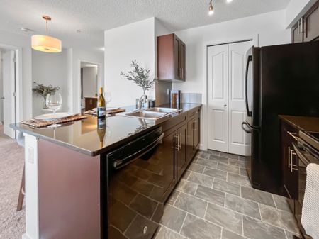AMAZING & FAMILY FRIENDLY 2 BED, 1 BATH APARTMENT W/ UNDERGROUND PARKING STALL IN THE COMMUNITY OF RUTHERFORD - Photo 4