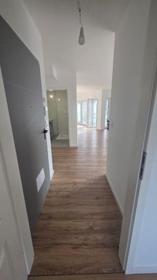 Neubauwohnung (Erstbezug) mit 2 Zimmern und Tiefgaragenstellplatz in Köln-Sürth - Foto 1