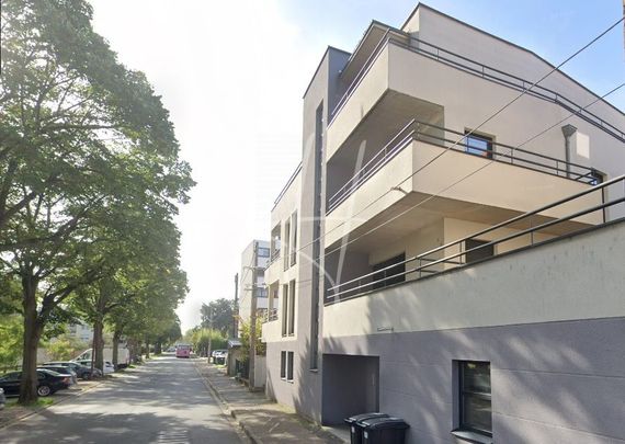 Très bel appartement à louer au BAN-SAINT-MARTIN avec cuisine équipée, balcon et garage - Photo 1