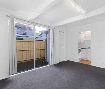 Charming 2BR Townhouse with Single garage - Photo 2