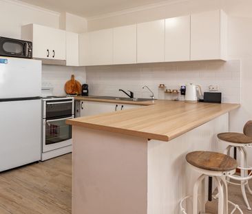 Convenient Lakeside Living with Carport - Photo 4