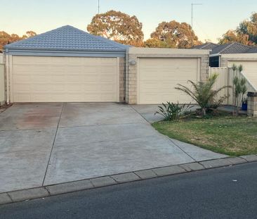 Charming, Secure 4-Bedroom, 2-Bathroom Home, Featuring Triple Garag... - Photo 1