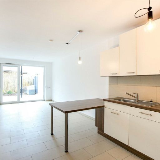 Wohntraum mit Gartenterrasse in ruhiger, kleiner Anlage nur 50m zum Badeteich! - Photo 1