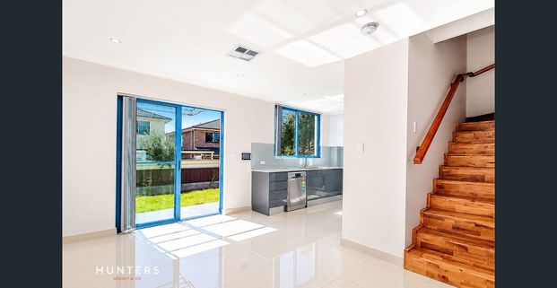 Spacious Double Brick Townhouse - Photo 1