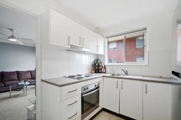 “Top-Floor Convenience” - Photo 1