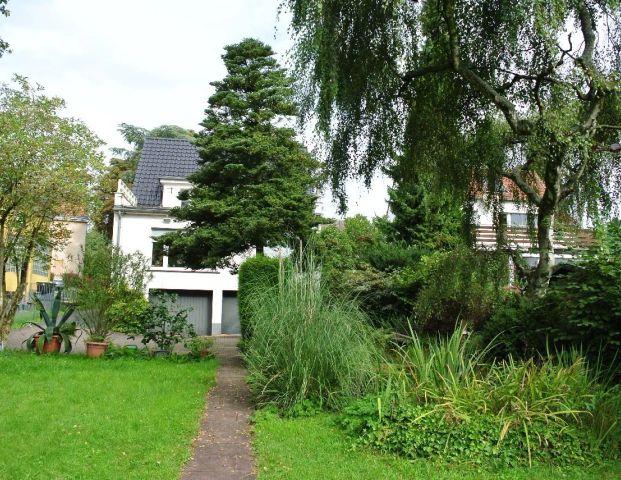 Freistehendes Einfamilienhaus mit großem Garten mit Obstbäumen zu vermieten. - Photo 1