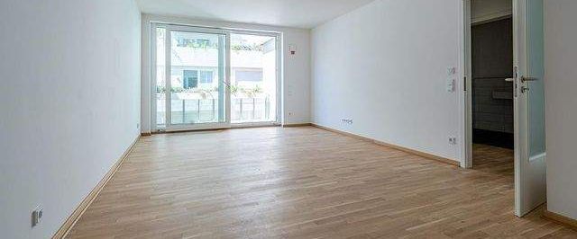 Charmante Neubauwohnung mit hofseitigem Balkon, Fußbodenheizung, EBK, Gäste-WC! - Foto 1