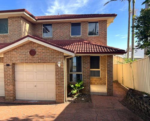 Well Presented Townhouse with Water Views!! - Photo 1