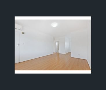 Immaculate Upstairs Unit in Convenient Location - Photo 2