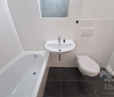 Hochparterre - Wohnung mit 2 Zimmern, offener Küche und Balkon in N... - Photo 3