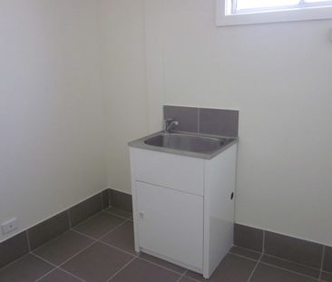 Spacious Three Bedroom Home in Convenient Waratah Location - Photo 6
